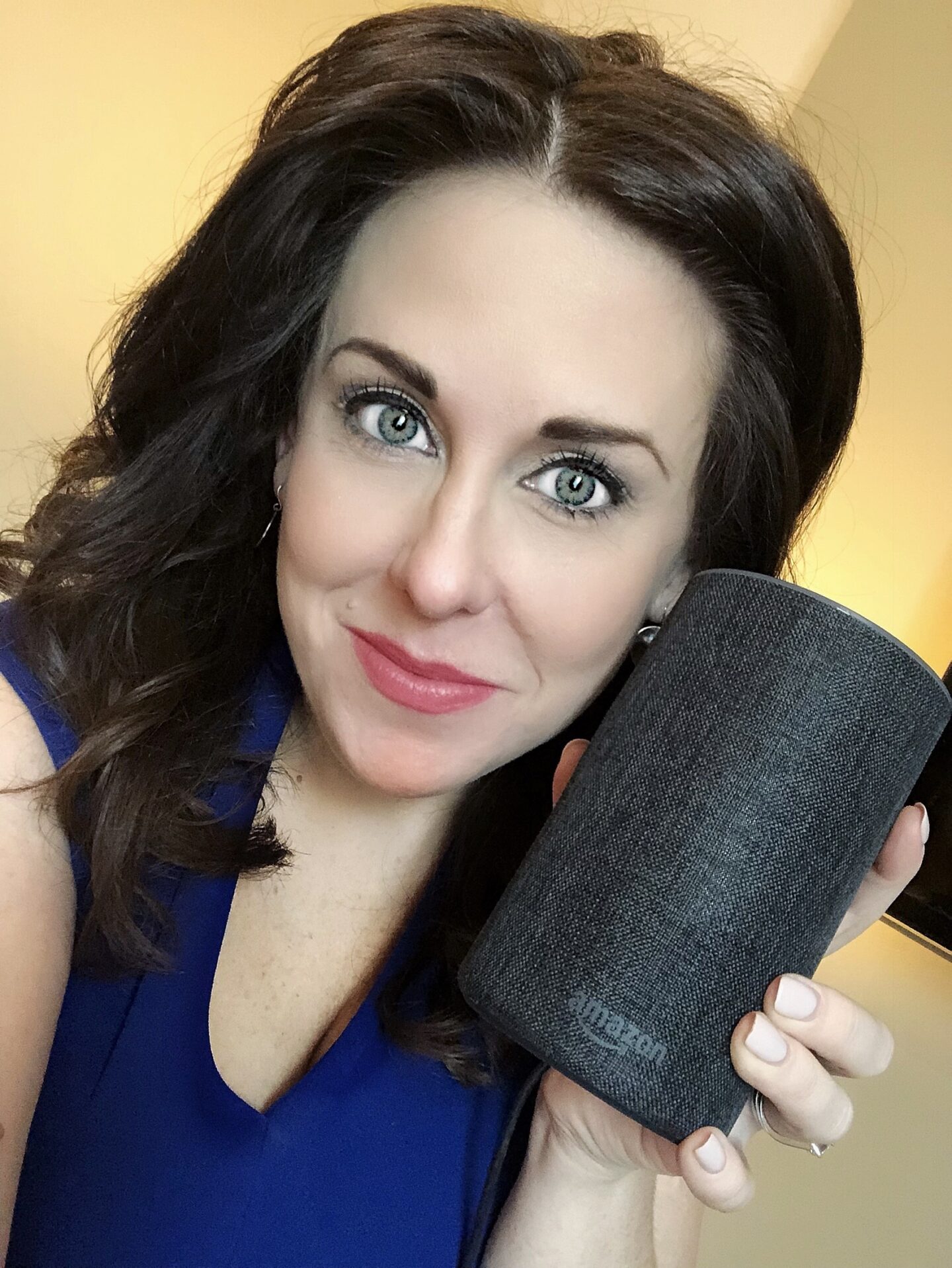 Kara Gammell with a second hand Amazon Echo 